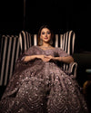 DARK LAVENDER NET FLORAL SEQUINS LEHENGA WITH ALL OVER FRENCH KNOTS AND RESHAM HANDWORK