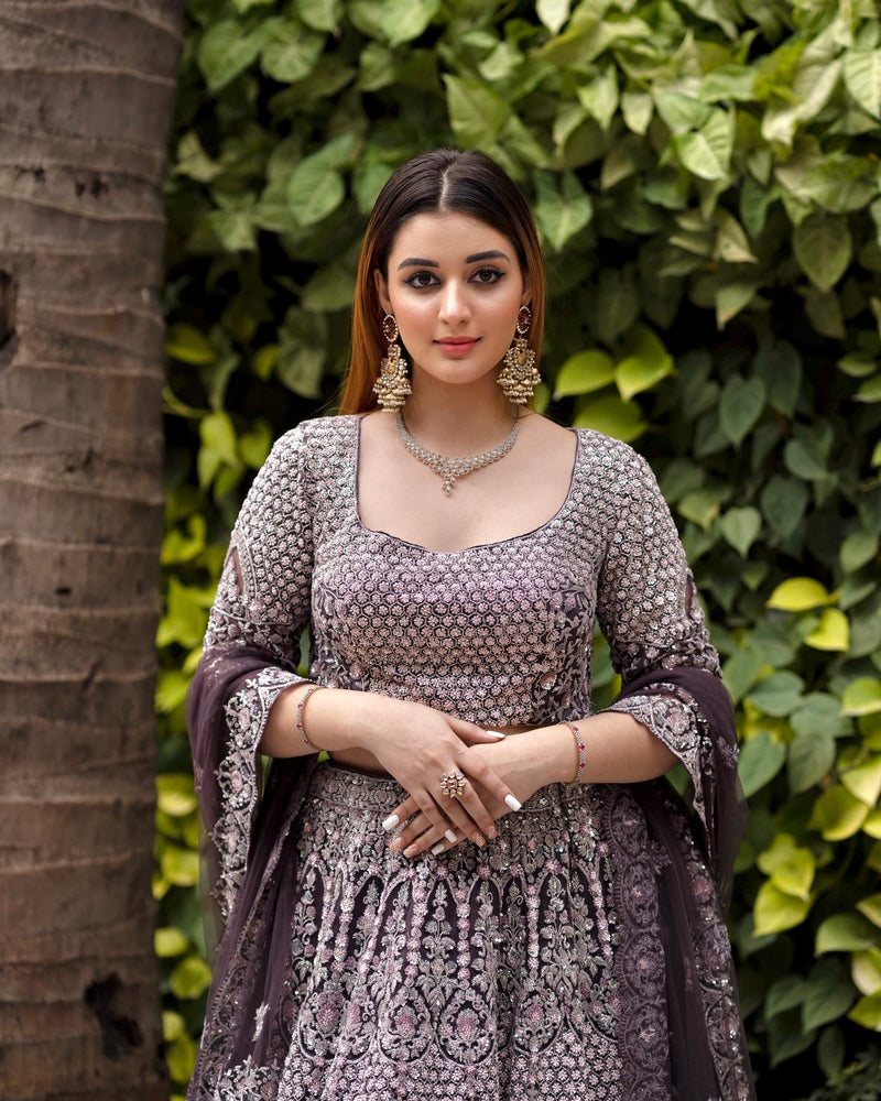 DARK LAVENDER NET FLORAL SEQUINS LEHENGA WITH ALL OVER FRENCH KNOTS AND RESHAM HANDWORK