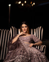 DARK LAVENDER NET FLORAL SEQUINS LEHENGA WITH ALL OVER FRENCH KNOTS AND RESHAM HANDWORK