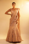PEACH MERMAID DRAPED SAREE WITH SELF EMBROIDERED FLORAL DETAILING OF CUT WORK AND PEARLS