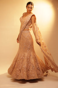 PEACH MERMAID DRAPED SAREE WITH SELF EMBROIDERED FLORAL DETAILING OF CUT WORK AND PEARLS