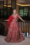 RED RAW SILK BRIDAL LEHENGA WITH ALL OVER ZARDOSI WORK AND THREAD OF MULTICOLOURED FLOWERS