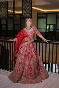 RED RAW SILK BRIDAL LEHENGA WITH ALL OVER ZARDOSI WORK AND THREAD OF MULTICOLOURED FLOWERS