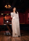 CHAMPAGNE GOLD DRAPED SAREE EMBELLISHED WITH INTRICATE PEARL & MIRROR WORK