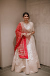 OFF WHITE RAW SILK RAJWADI BRIDAL LEHENGA WITH SELF THREAD AND ZARDOSI WORK