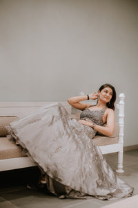 GREY FISHCUT BACKLESS GOWN WITH CRYSTAL AND SEQUIN EMBELLISHMENTS