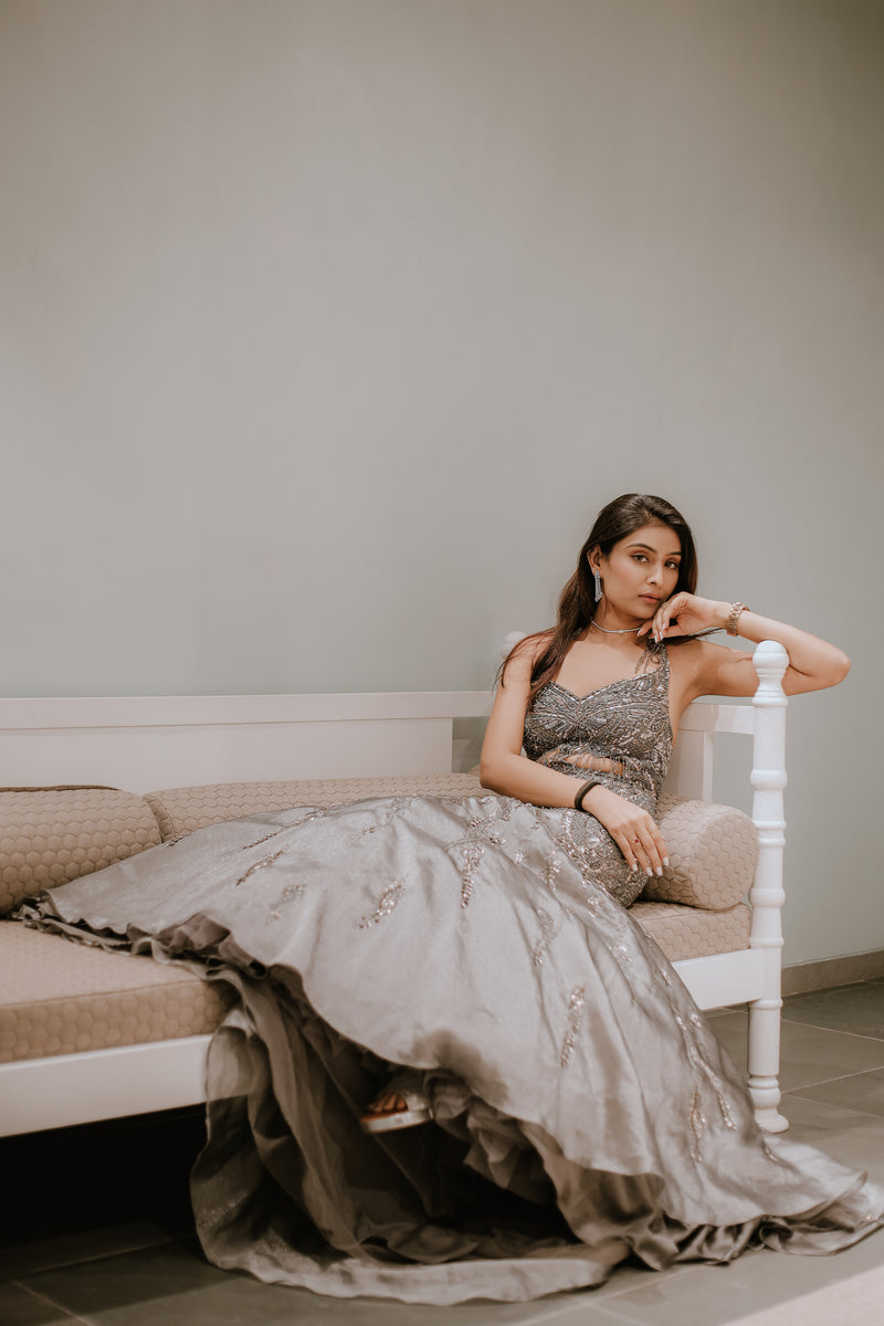 GREY FISHCUT BACKLESS GOWN WITH CRYSTAL AND SEQUIN EMBELLISHMENTS
