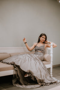 GREY FISHCUT BACKLESS GOWN WITH CRYSTAL AND SEQUIN EMBELLISHMENTS