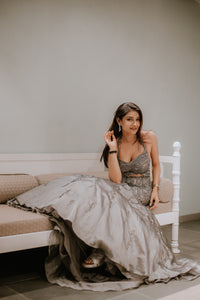 GREY FISHCUT BACKLESS GOWN WITH CRYSTAL AND SEQUIN EMBELLISHMENTS